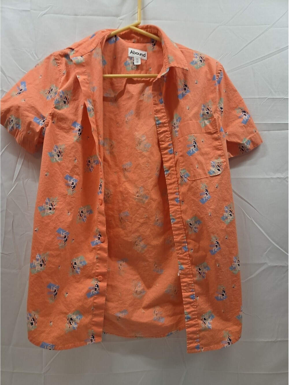 men's Abound brand short-sleeve shirt features a vibrant orange base size XXS
